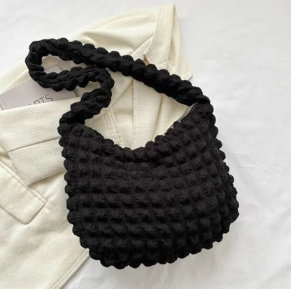 Bolso de mano acolchado