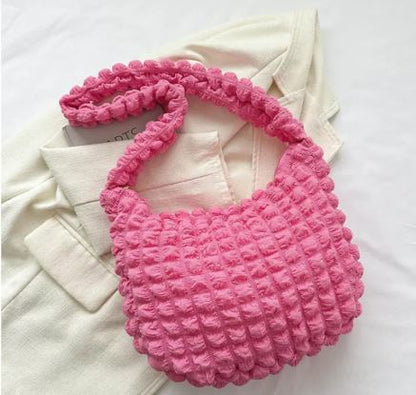 Bolso de mano acolchado